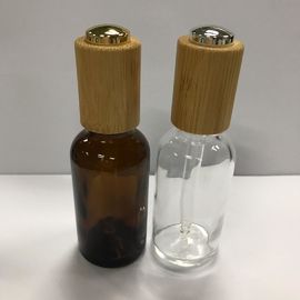 Dropper γυαλιού μπουκάλια, ηλέκτρινο μπουκάλι ουσιαστικού πετρελαίου 30ml με τον ξύλινο cOem μπουκαλιών φροντίδας δέρματος περιλαίμιων